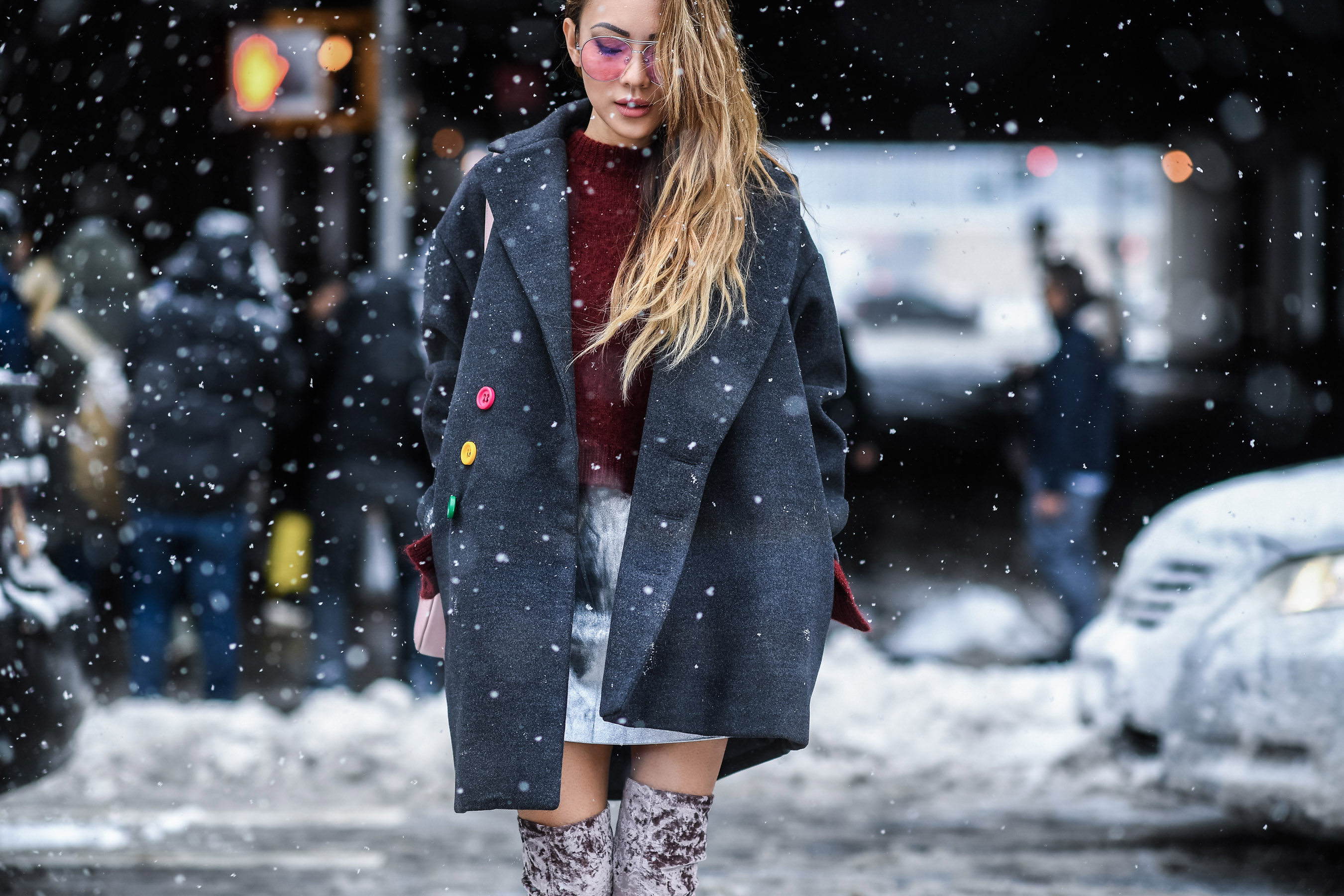 Places for Great Snow Photos in NYC // NotJessFashion.com // Over the knee velvet boots, silver mini skirt, oversized menswear inspired coat, burgundy knit sweater, jessica wang