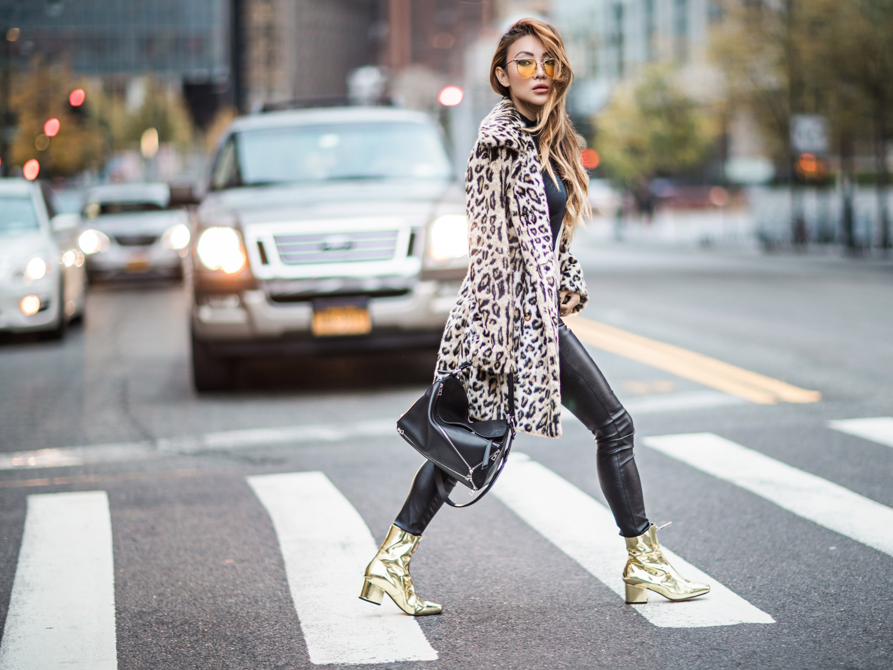Essential Photography Tips for New Bloggers - Leopard coat, Leather Pants, and Gold Boots // Notjessfashion.com // yellow aviator sunglasses, winter style, winter outfit, layered outfit, street style fashion, fashion blogger street style, new york fashion blogger, faux fur leopard coat, faux fur coat, asian blogger, jessica wang, edgy style