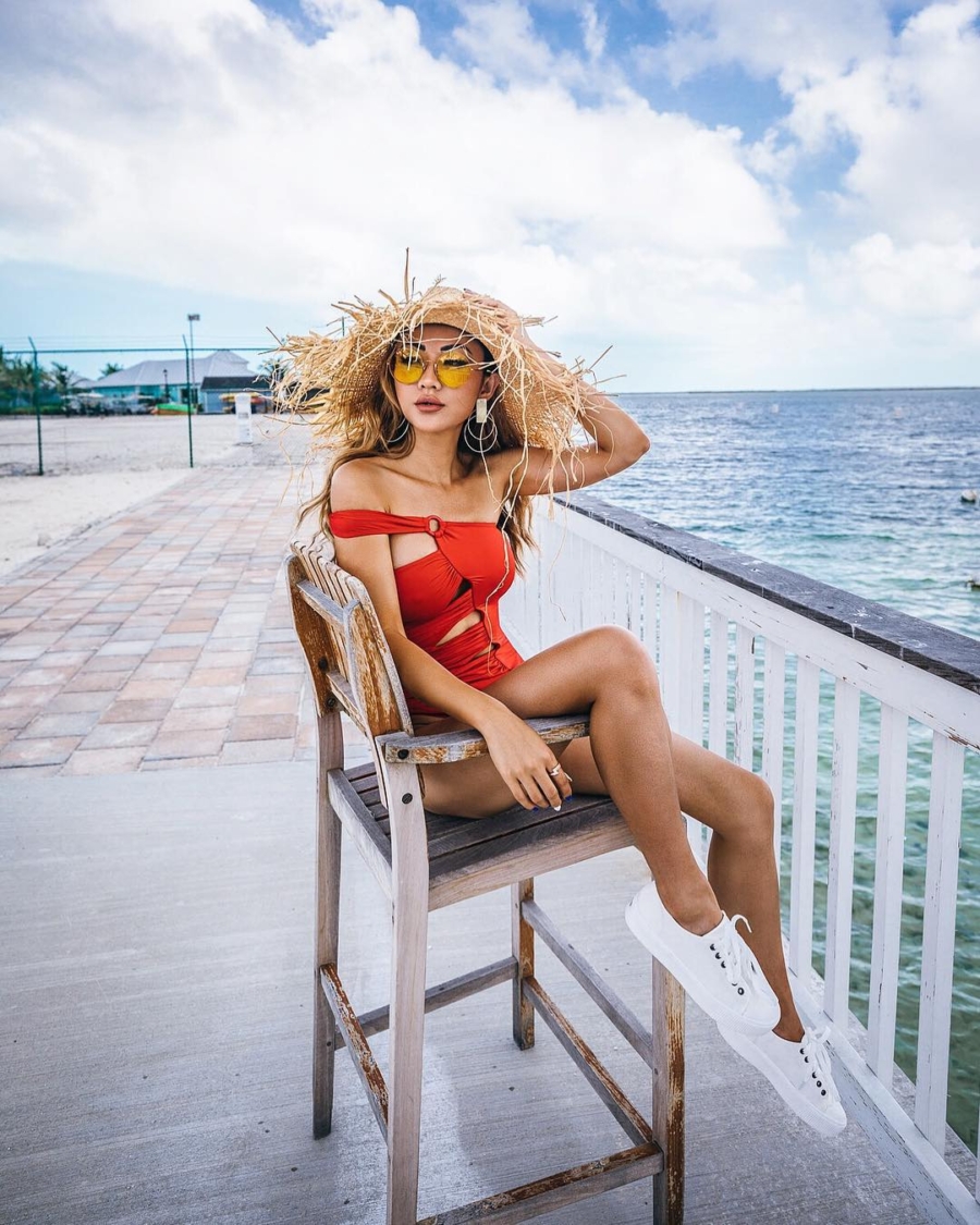 what to pack for your next beach vacation, red swimsuit and straw hat // Notjessfashion.com