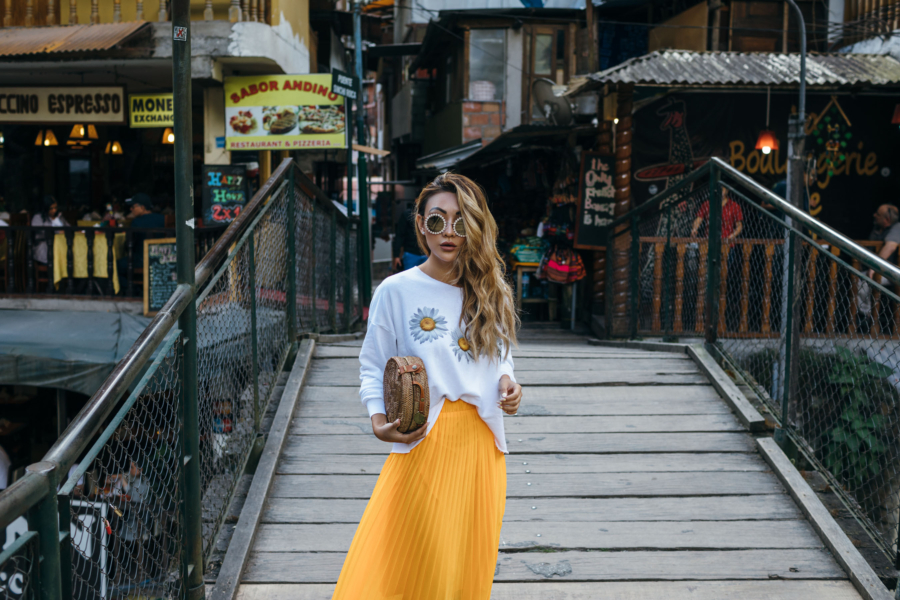 Exploring Aguas Calientes in Yellow Pleated Skirt - New Sunglasses Shapes That Are Fun and Luxe // NotJessFashion.com