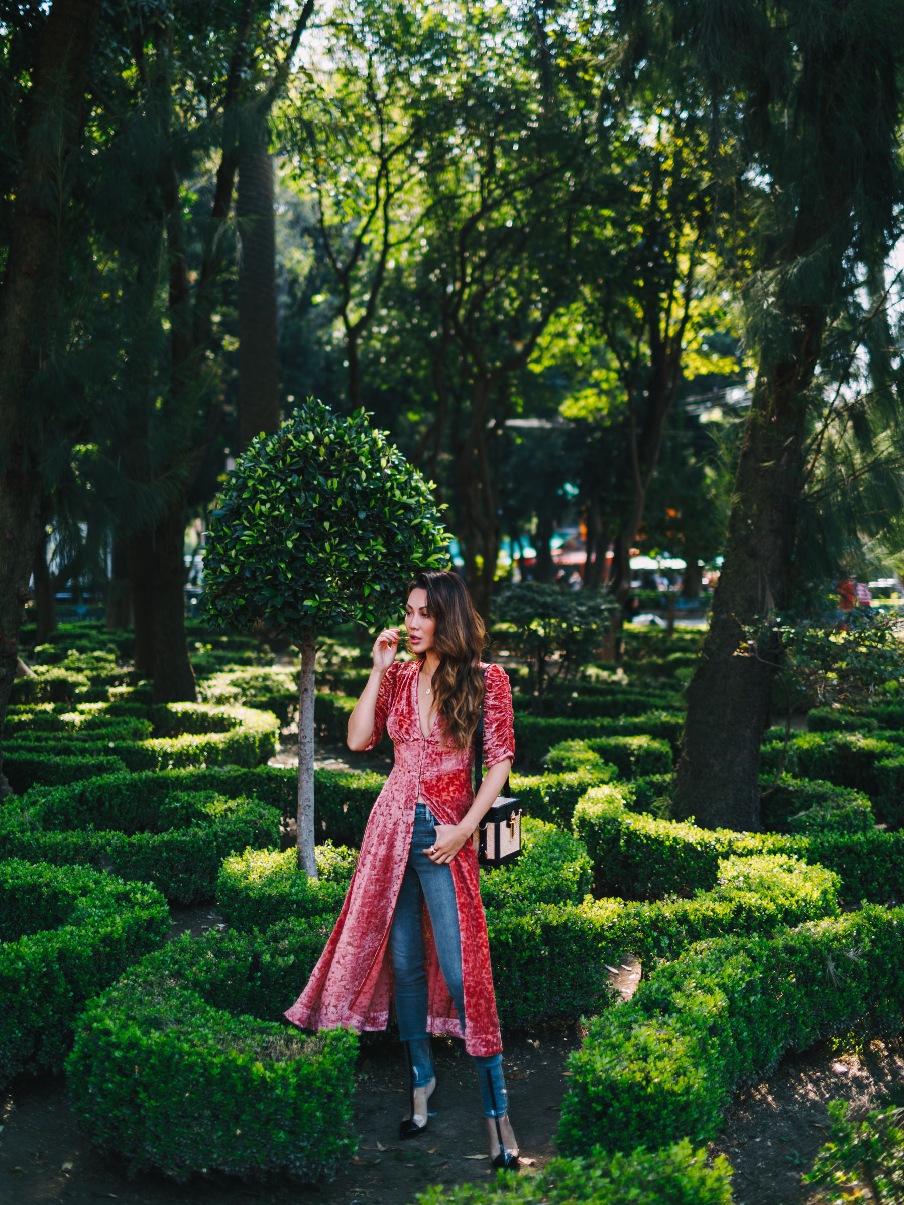 Instagram Hot Spots in Mexico - Pink Velvet Dress over Jeans and Clear Boots // Notjessfashion.com