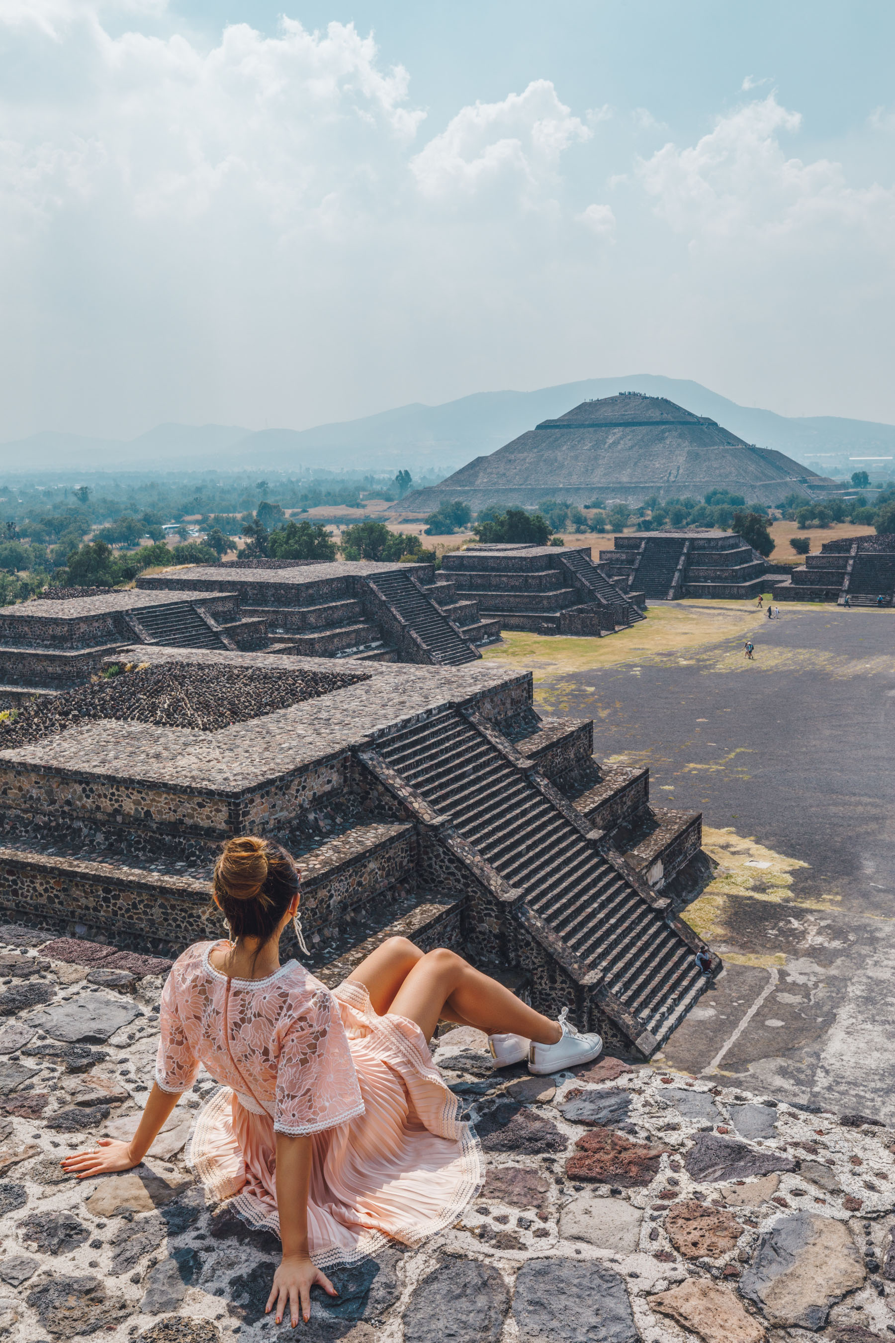 Guide to Wearing Color For Spring - blooming dahlia, peach dress, spring 2018 colors, Lace Pink Pleated Dress in Mexico City // Notjessfashion.com