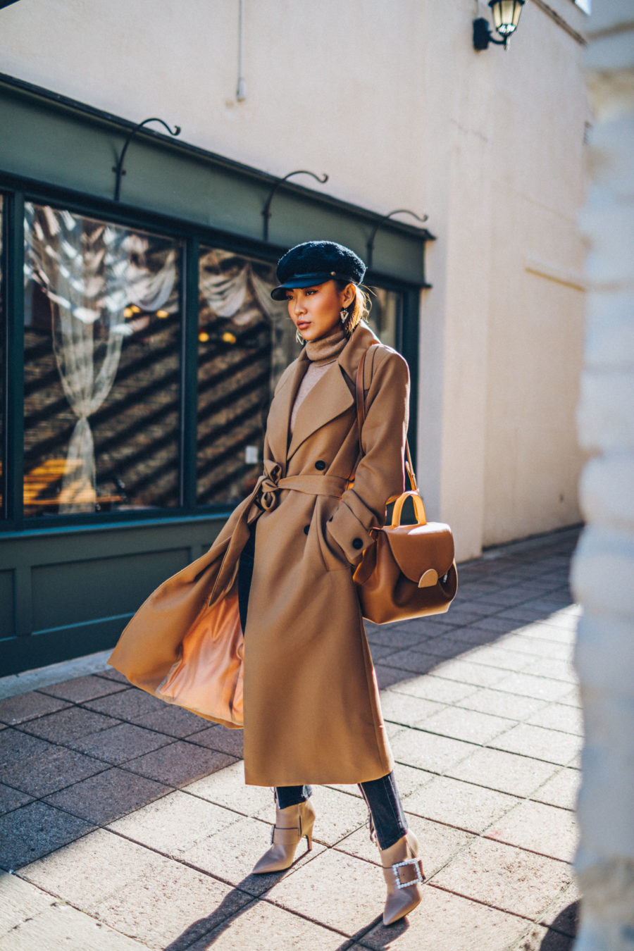 Clothing items worth investing in - Belted Camel Coat with Dark Denim Baker Boy Cap and Satchel // Notjessfashion.com