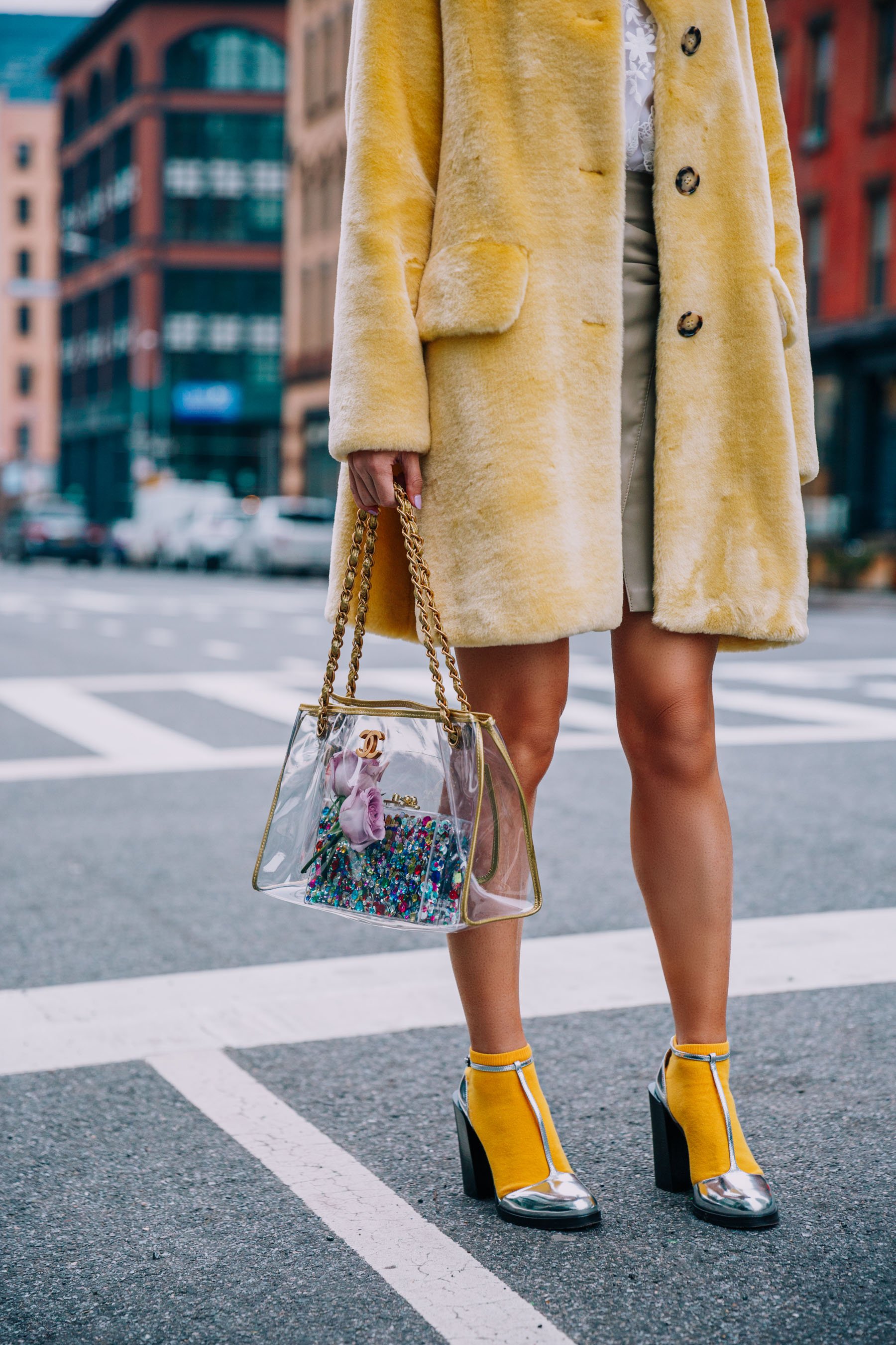 NYFW 2018 Street Style - Shrimps Yellow Fur Coat, Yellow Earrings, and Clear Chanel Bag // Notjessfashion.com