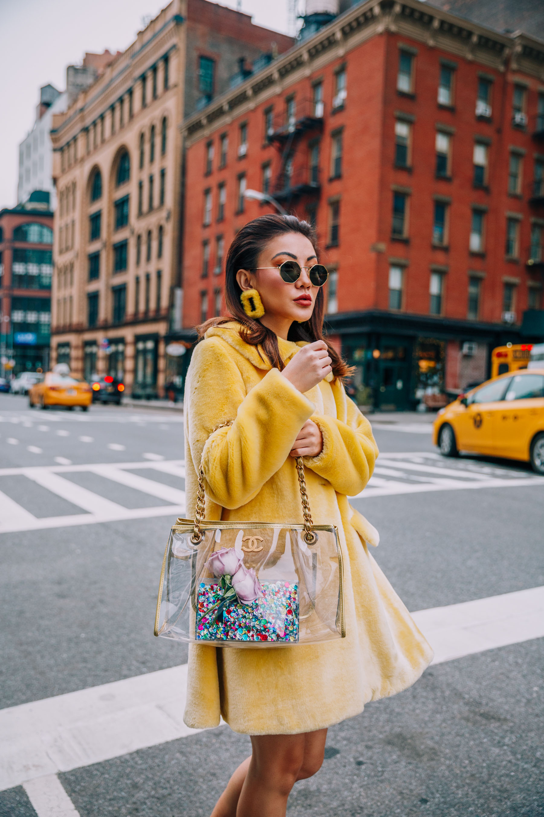 NYFW 2018 Street Style - Shrimps Yellow Fur Coat, Yellow Earrings, and Clear Chanel Bag // Notjessfashion.com