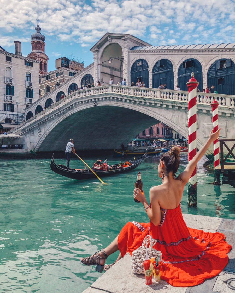 Instagram Outfits in Venice - red sun dress, venice canals, venice bridge, travel blogger, gondola watching in venice, rialto bridge