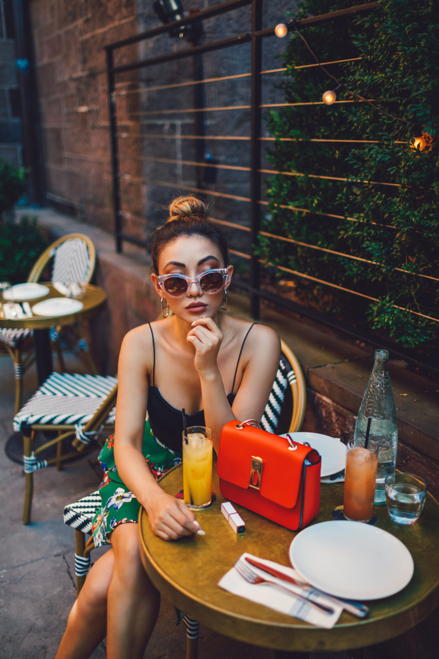 best activities in new york - jessica wang dining outdoors, wearing green floral Skirt, anya hindmarch mini bag // Jessica Wang - Notjessfashion.com