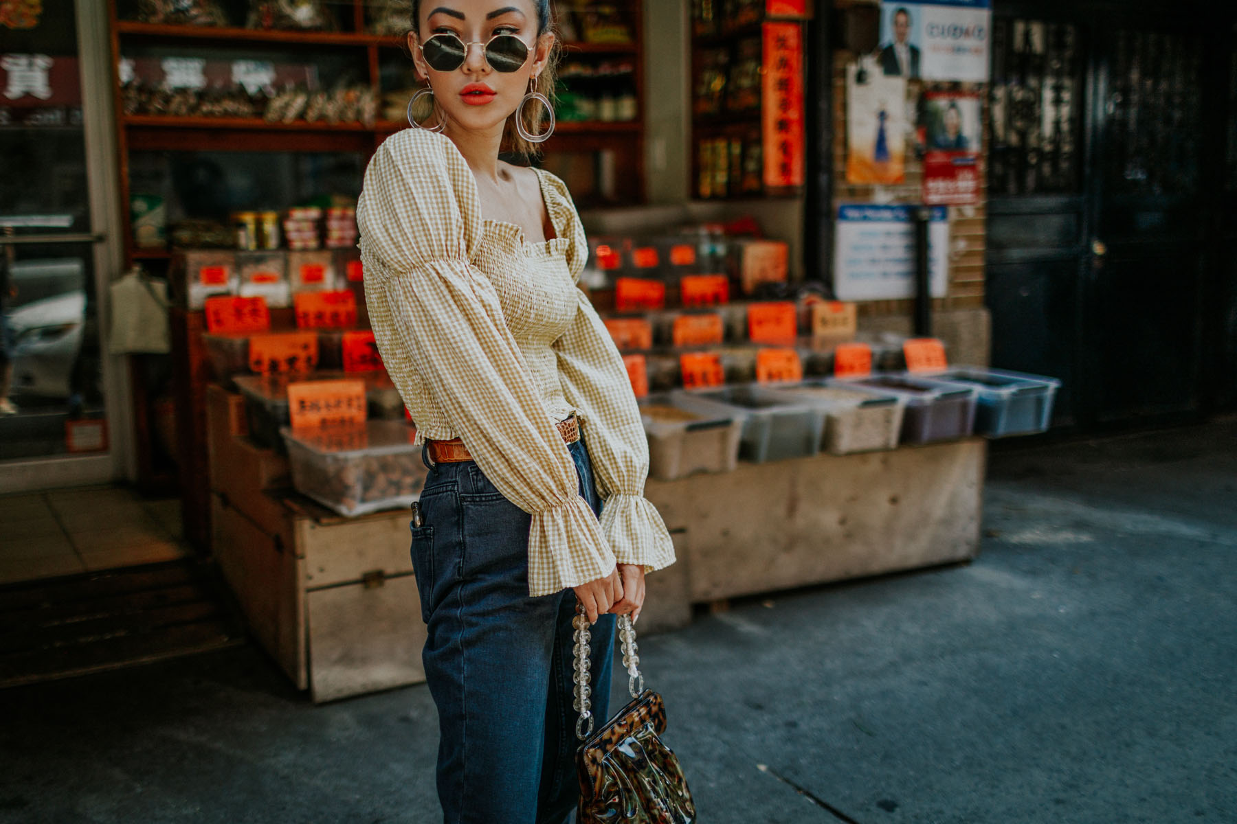 linen pieces for summer, linen yellow top, BDG Mom Jeans, smocked top, western belt, hexagonal sunglasses, NYC fashion blogger // Notjessfashion.com