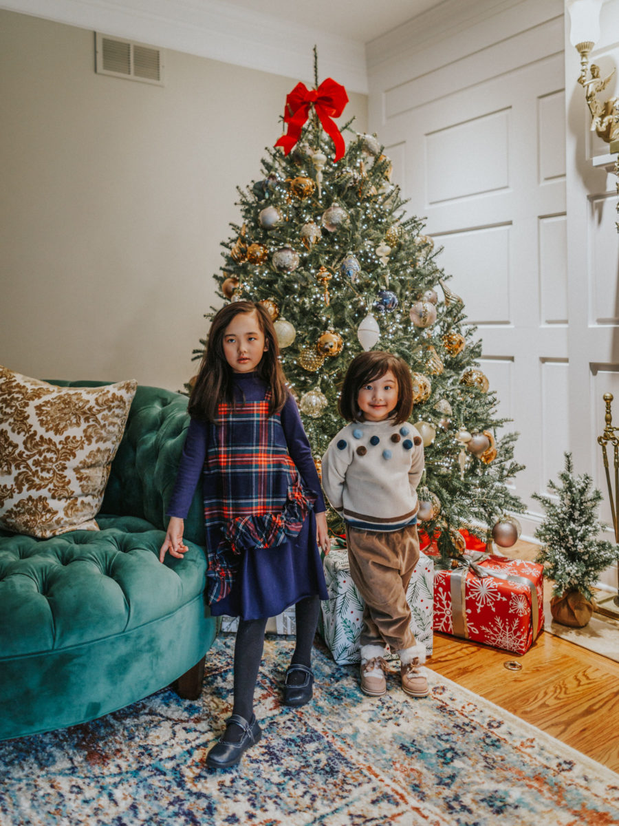 jessica wang's kids sit by christmas tree and shares stocking stuffers for everyone // Jessica Wang - Notjessfashion.com