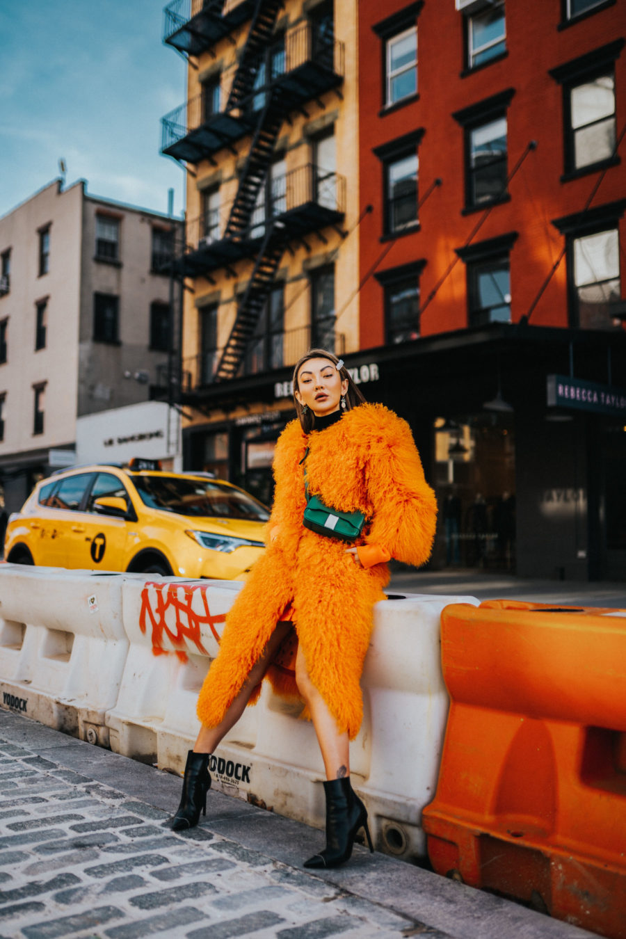 How to Elevate an Outfit Immediately - faux fur coat, orange faux fur coat street style // jessicawang.com