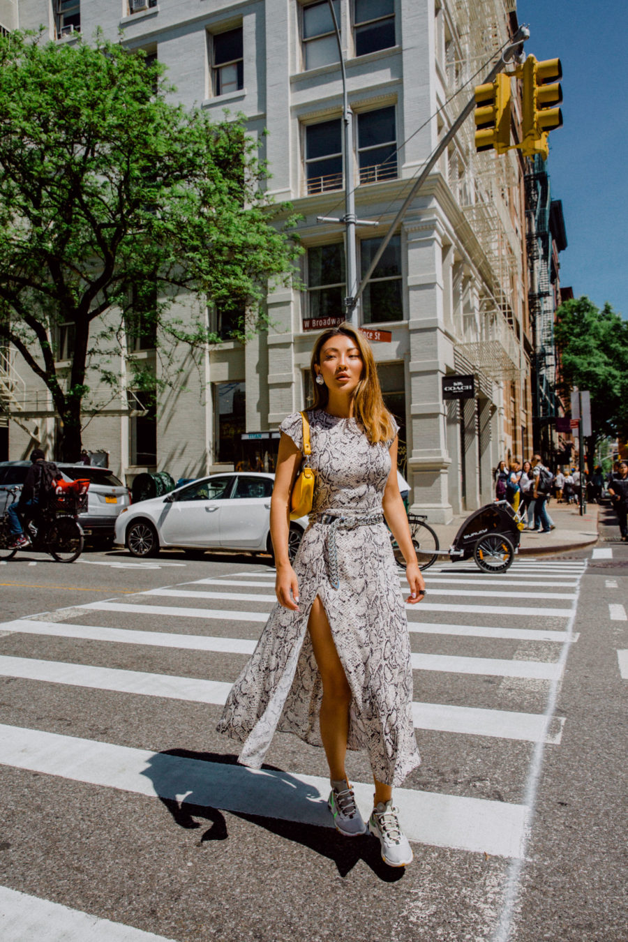 fashion blogger jessica wang wearing spring transitional pieces - snakeskin midi dress and nike sneakers // Notjessfashion.com