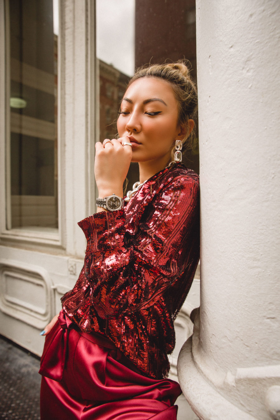 fashion blogger jessica wang shares holiday outfit ideas wearing sally lapointe sequin blouse and red satin pants // Notjessfashion.com