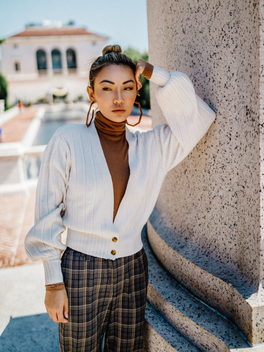 Jessica Wang wearing a brown turtleneck top, white cardigan and plaid pants with hoop earrings // Jessica Wang - Notjessfashion.com