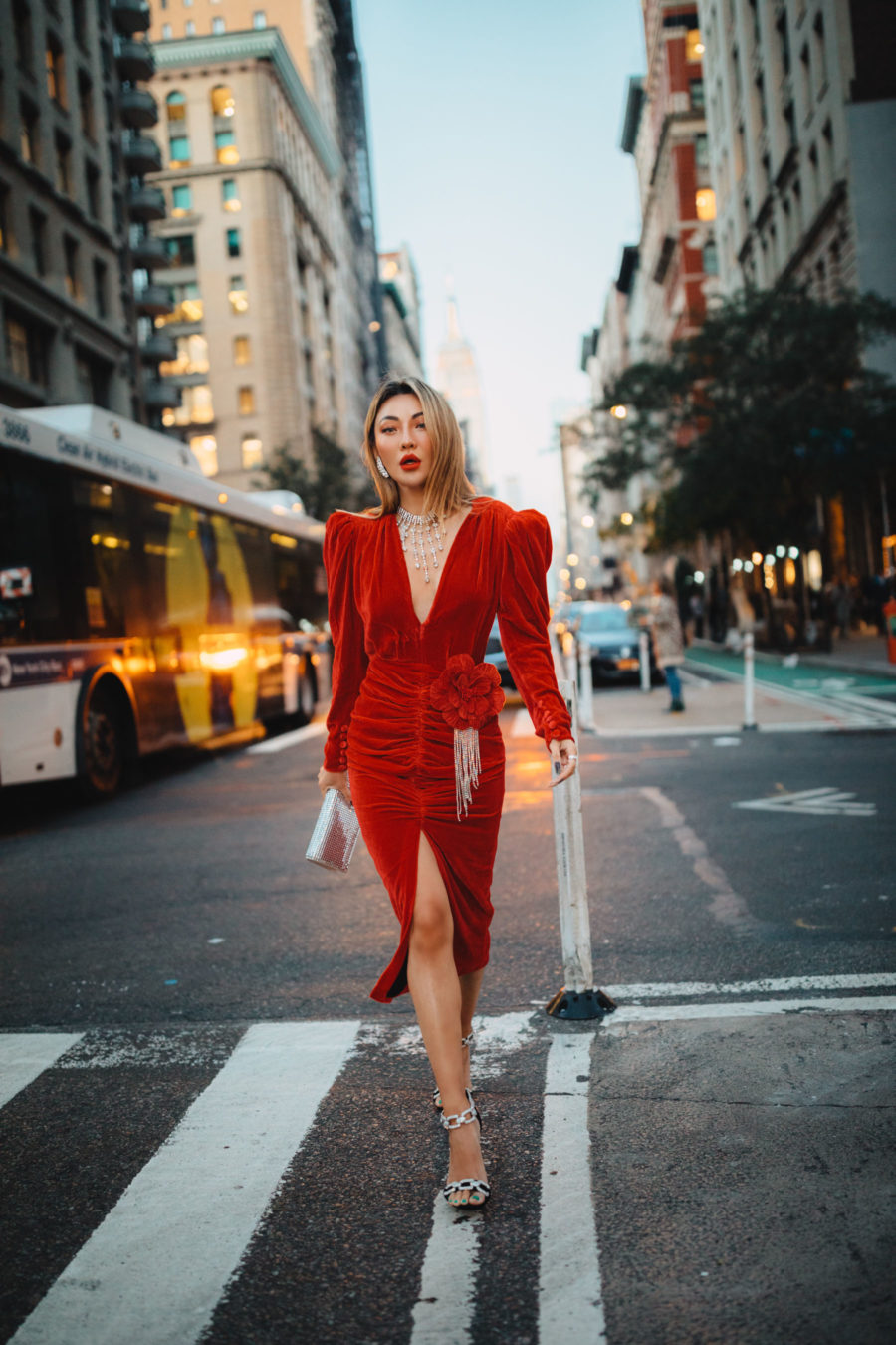 Christmas Outfits - holiday red - Red ruche velvet dress, rhinestone earrings, rhinestone necklace, metallic clutch, rhinestone heelsp// Jessica Wang - Notjessfashion.com