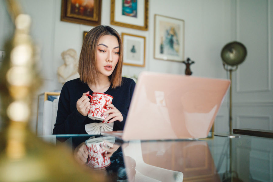 fashion blogger jessica wang wears bow tie sweater and patent leather joggers sharing tips to stay safe online shopping // Notjessfashion.com