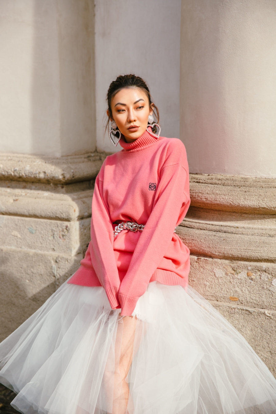 spring trends that are worth the investment featuring coral pink sweater and unravel denim tulle skirt // Notjessfashion.com
