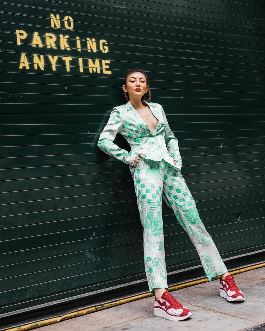 jessica wang wearing green suit with stuart weitzman sneakers // Notjessfashion - Notjessfashion.com