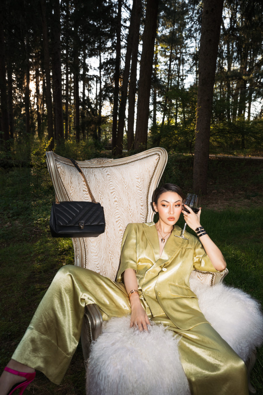 jessica wang wearing a satin blazer with satin wide leg pants and a black quilted shoulder bag while sharing her fall capsule wardrobe from the nordstrom anniversary sale // Jessica Wang - Notjessfashion.com