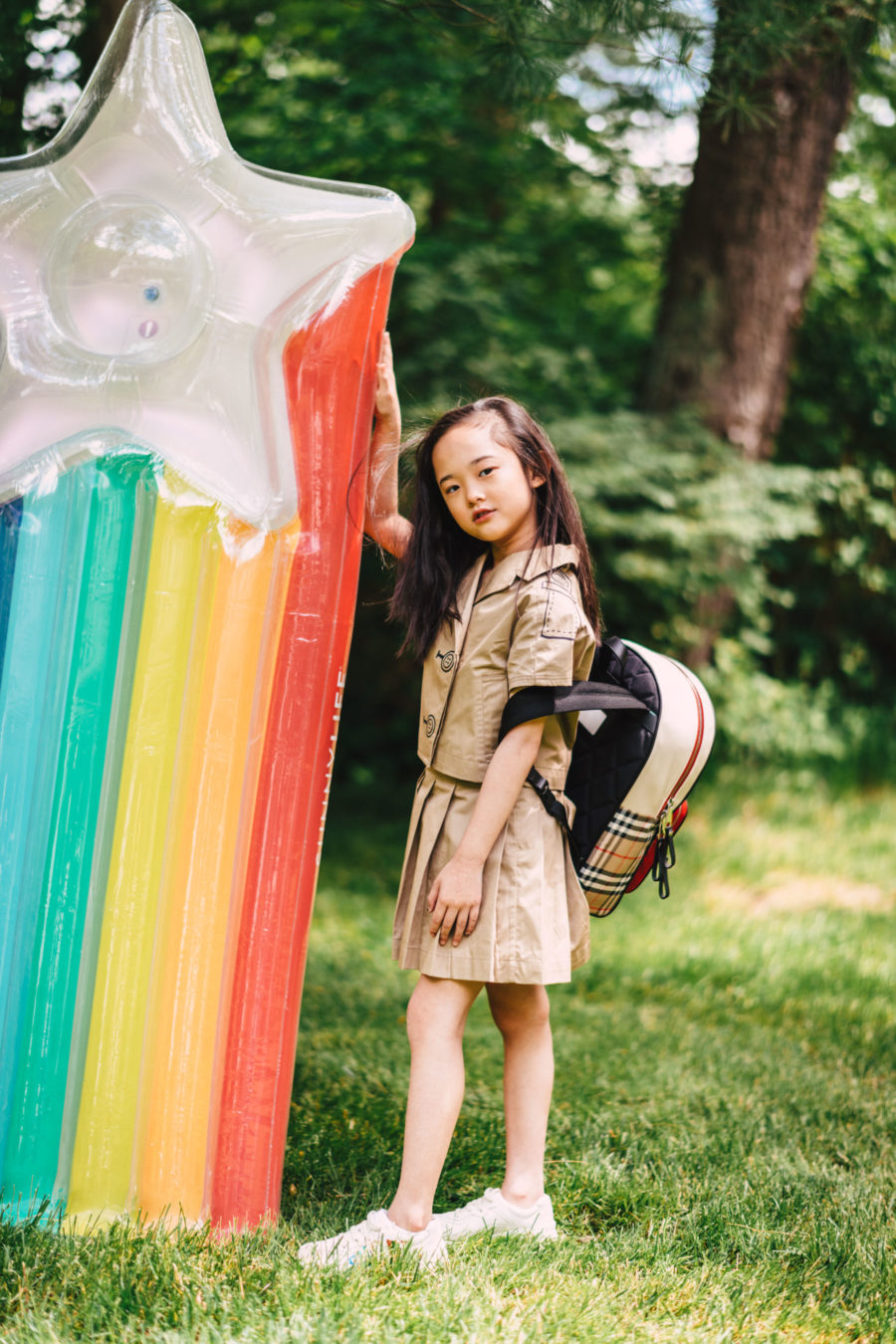 luisaviaroma summer outfits for kids featuring burberry skirt and backpack // Jessica Wang - Notjessfashion.com