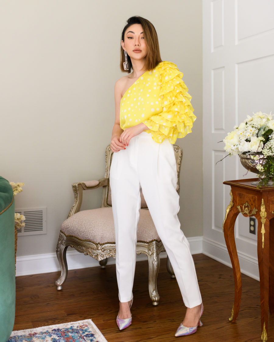 spring transitional outfit with a one shoulder ruffle top and white trousers // Jessica Wang - Notjessfashion.com