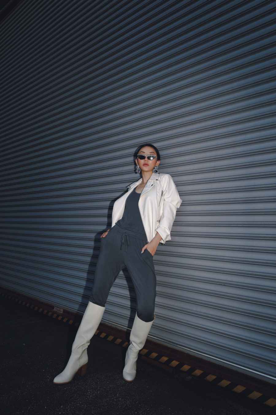 jessica wang wears knit jumpsuit and white leather jacket while sharing ways to transition your summer wardrobe to fall // Jessica Wang - Notjessfashion.com
