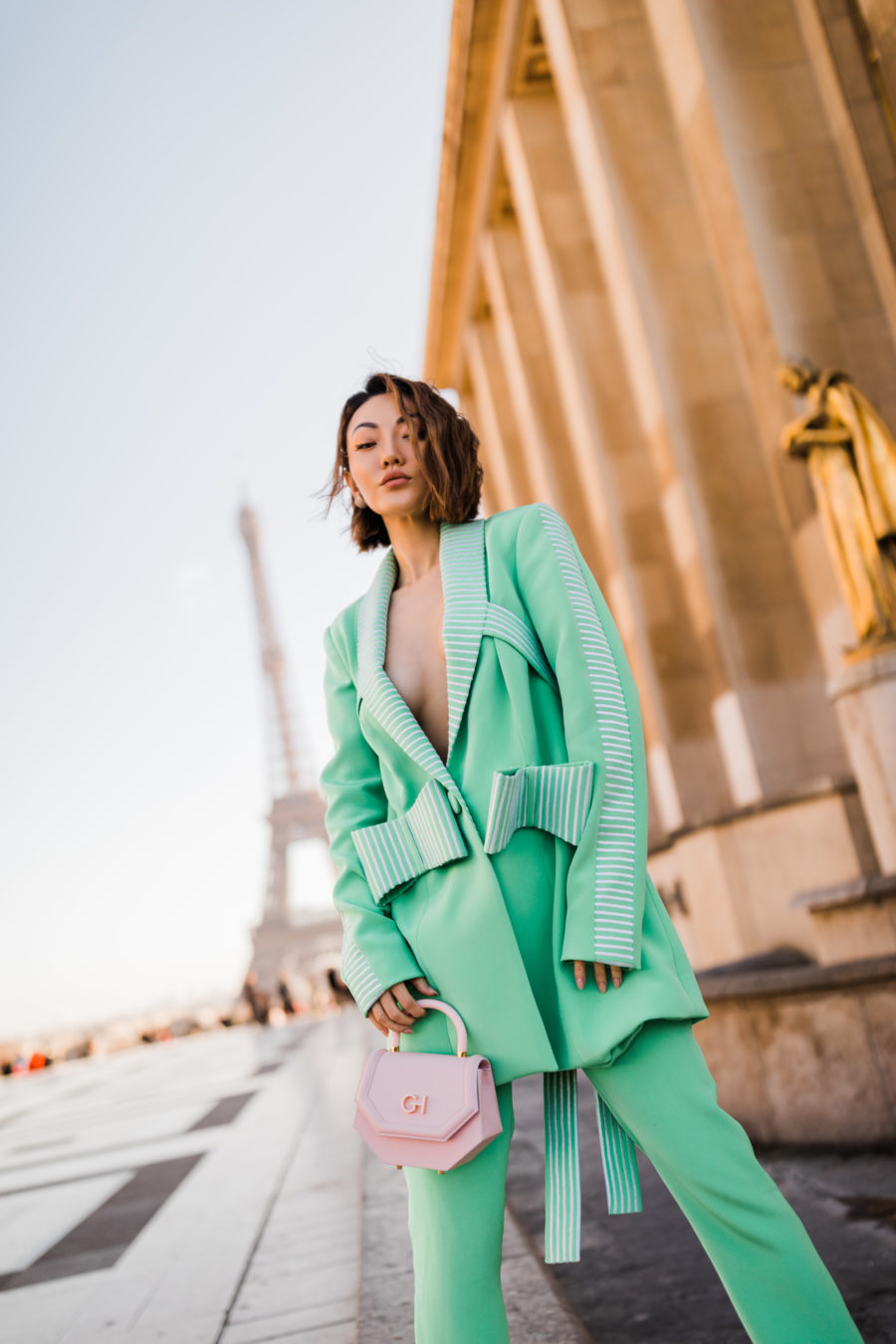 jessica wang wearing a green pastel blazer with bows and matching pants while sharing casual spring suits for women // Jessica Wang - Notjessfashion.com