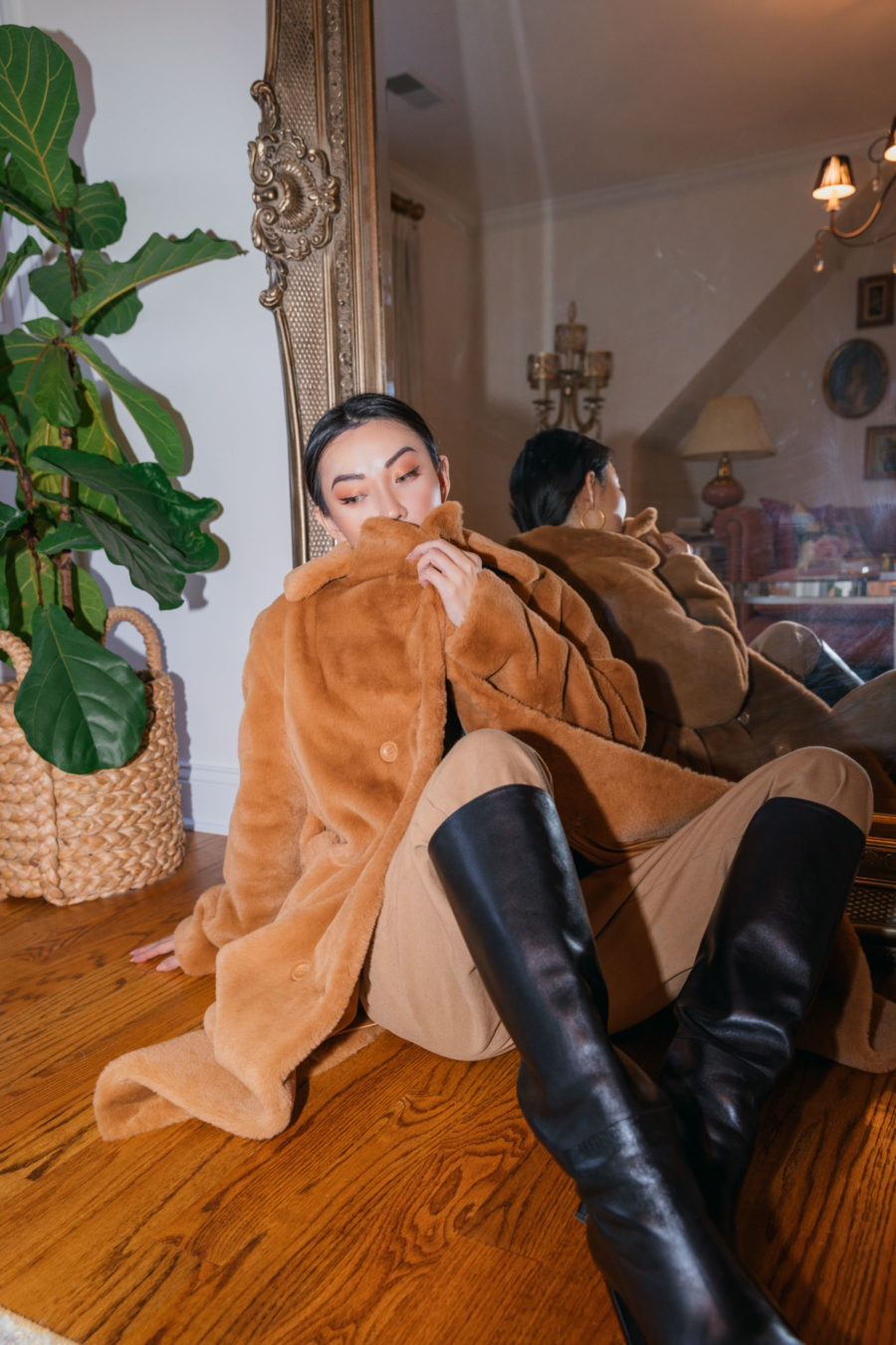 jessica wang wears stand faux fur coat with knee high boots and shares where to buy designer brands on sale // Jessica Wang - Notjessfashion.com