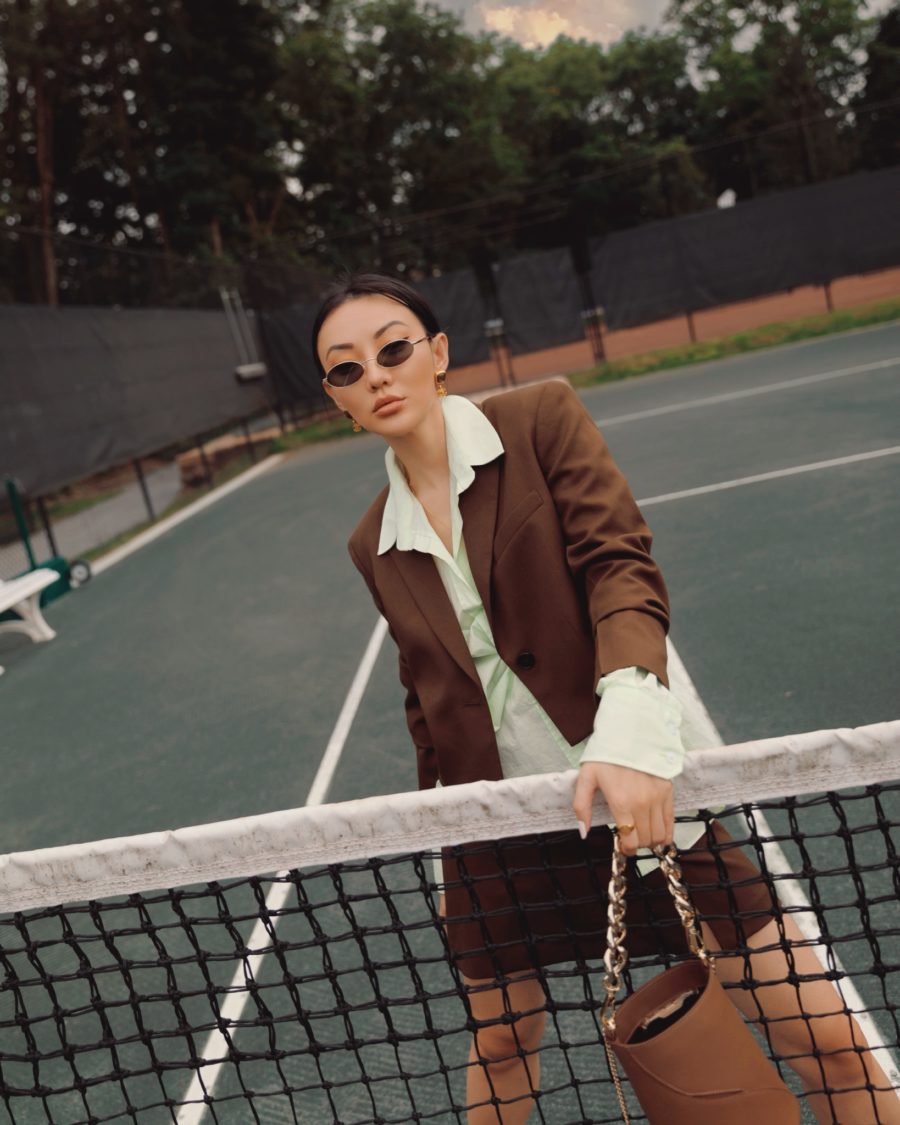 fashion blogger jessica carries bucket bag with gold chain strap and shares fall 2020 handbags // Jessica Wang - Notjessfashion.com