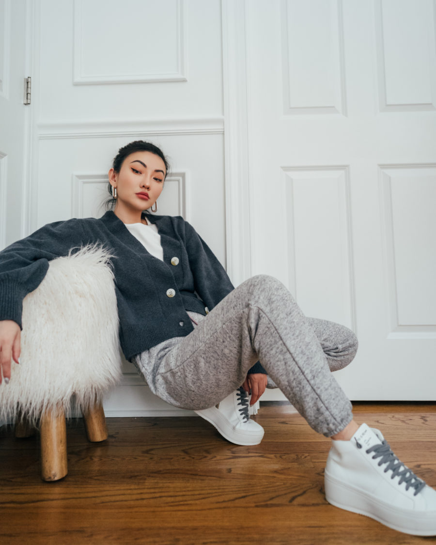 Jessica Wang wearing a knit caridgan and grey sweatpants while sharing emerging fashion brands 2022 // Jessica Wang - Notjessfashion.com