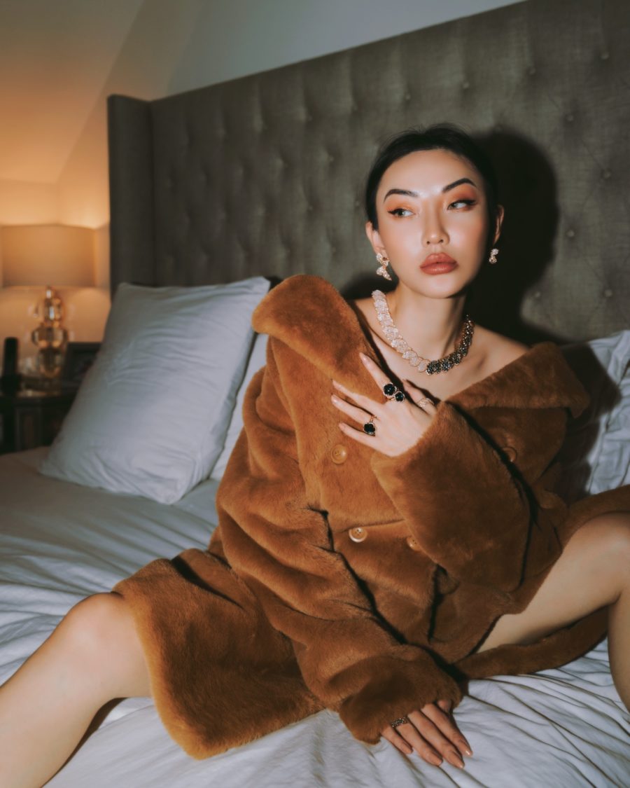 Jessica Wang wearing a fur coat with luxe accessories featuring a chunky necklace // Jessica Wang - Notjessfashion.com
