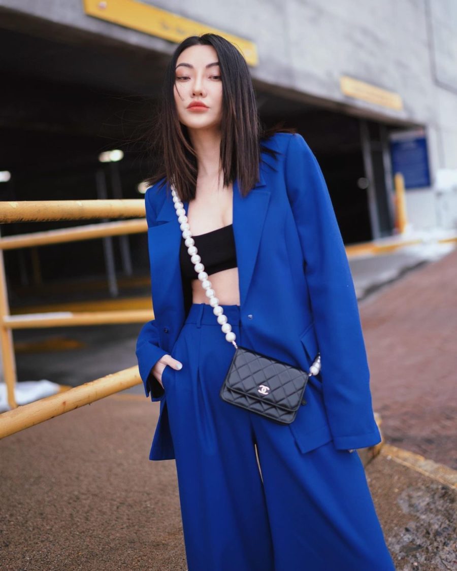 jessica wang wearing a cyan blazer with matching wide leg pants, a black bralette, and a chanel crossbody bag while sharing her fall capsule wardrobe from the nordstrom anniversary sale // Jessica Wang - Notjessfashion.com