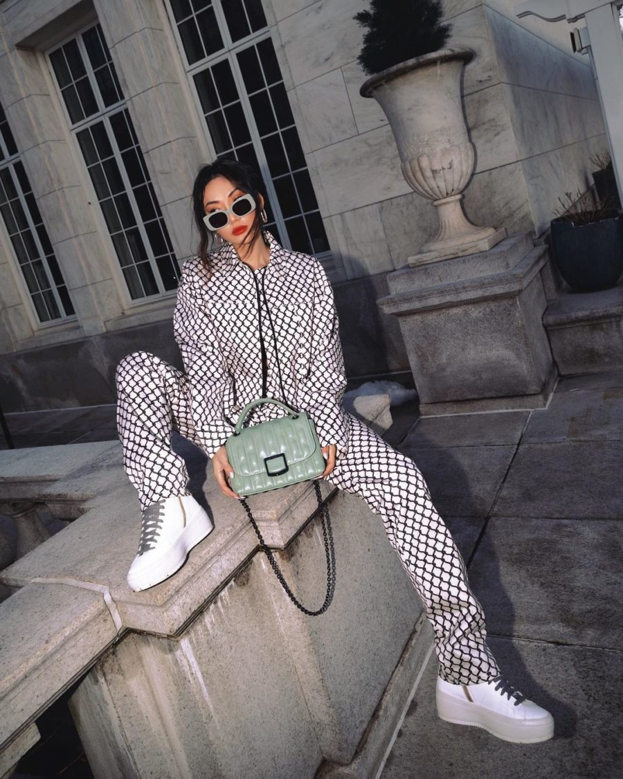 Jessica Wang wearing 2022 resort trends featuring a printed tracksuit // Jessica Wang - Notjessfashion.com