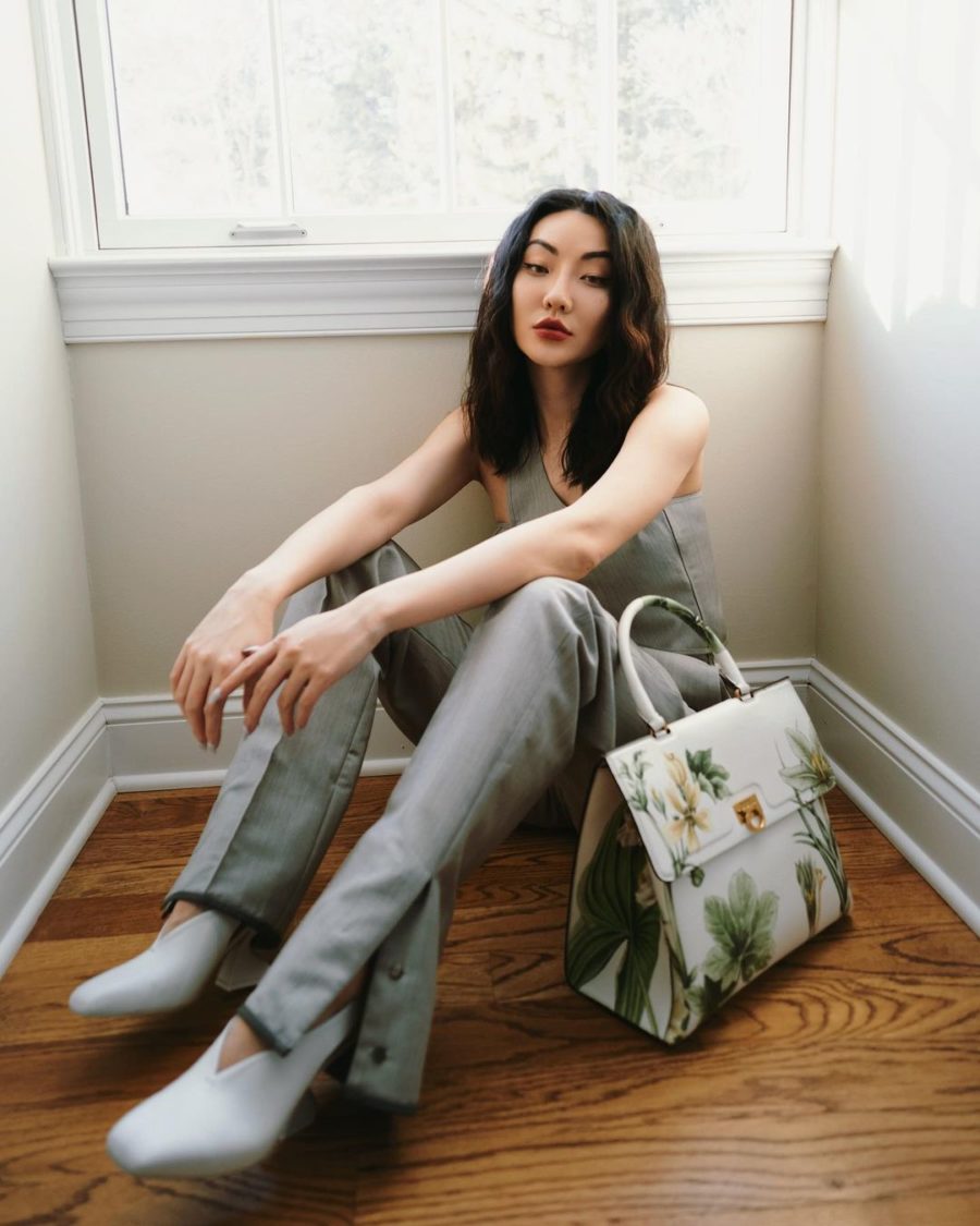 jessica wang wearing a gray tank top, split hem pants, and white pumps with a salvatore ferragamo trifolio handbag while sharing shoe essentials from the nordstrom sale // Jessica Wang - Notjessfashion.com