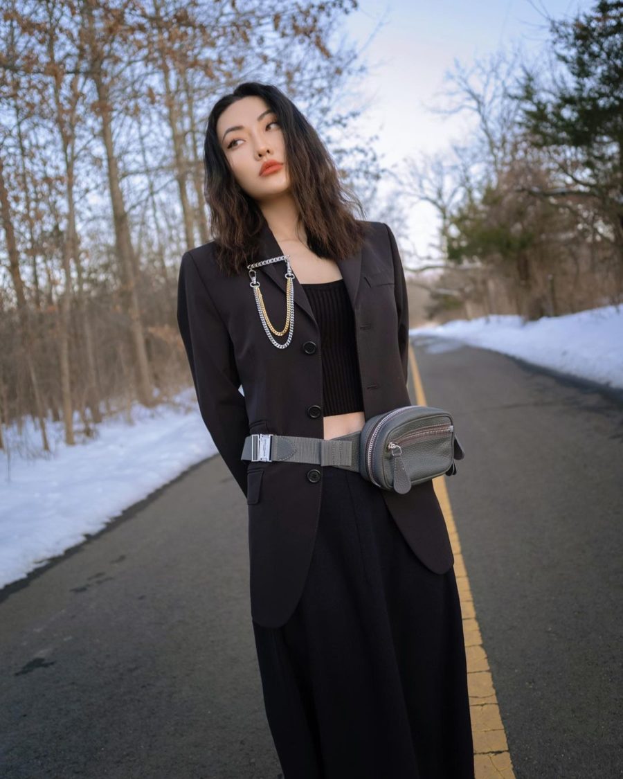 jessica wang wearing a black blazer with a lapel chain, knit tank top, and black trousers // Jessica Wang - Notjessfashion.com