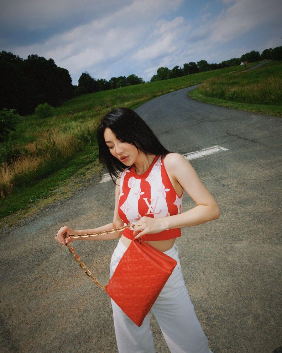 jessica wang wearing a louis vuitton stripe sweater vest with a red louis vuitton handbag while sharing the best labor day sales 2021 // Jessica Wang - Notjessfashion.com
