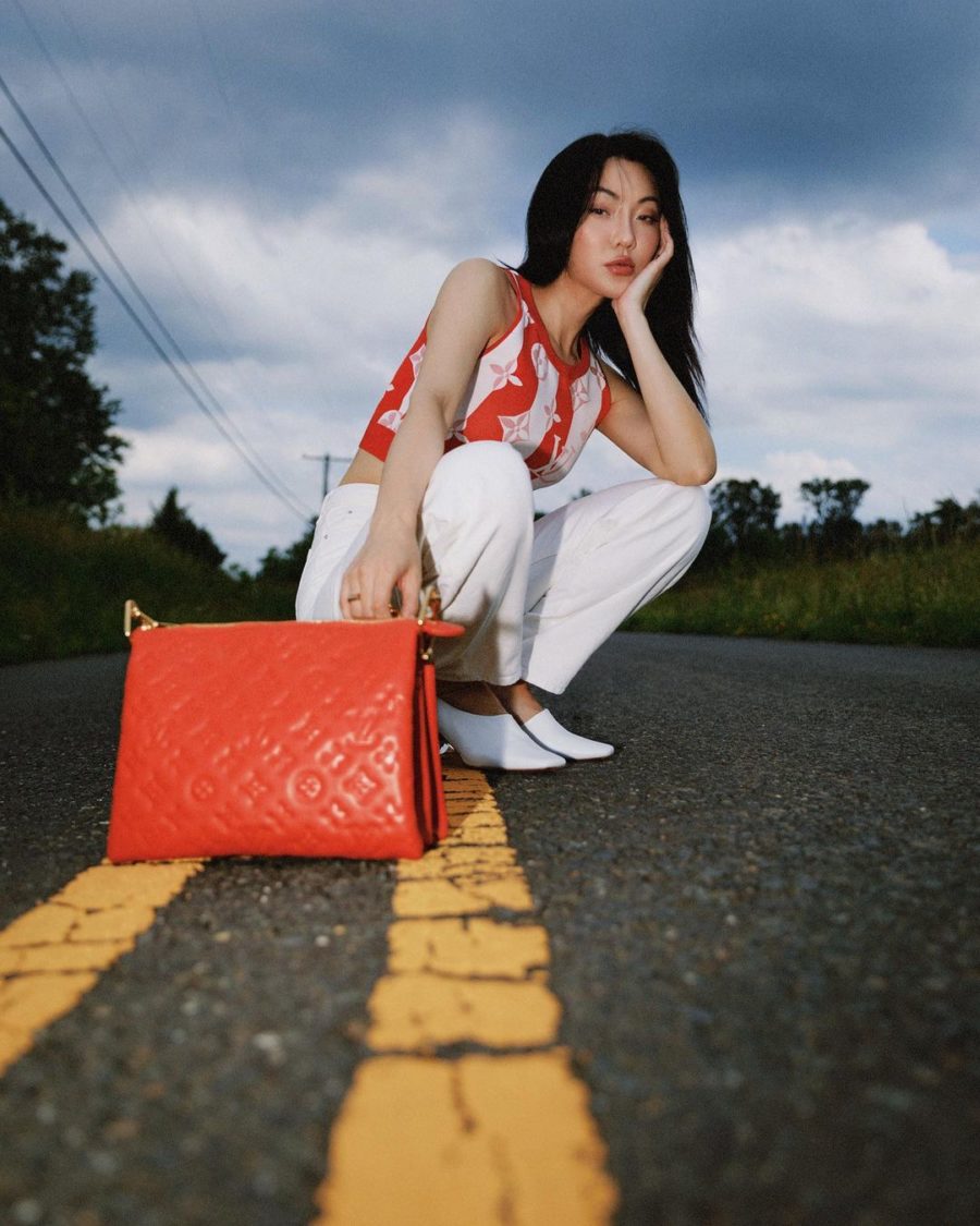 jessica wang wearing a Louis Vuitton beach monogram cropped tank top, white denim jeans, and louis vuitton coussin PM bag while sharing luxury designer finds // Jessica Wang - Notjessfashion.com