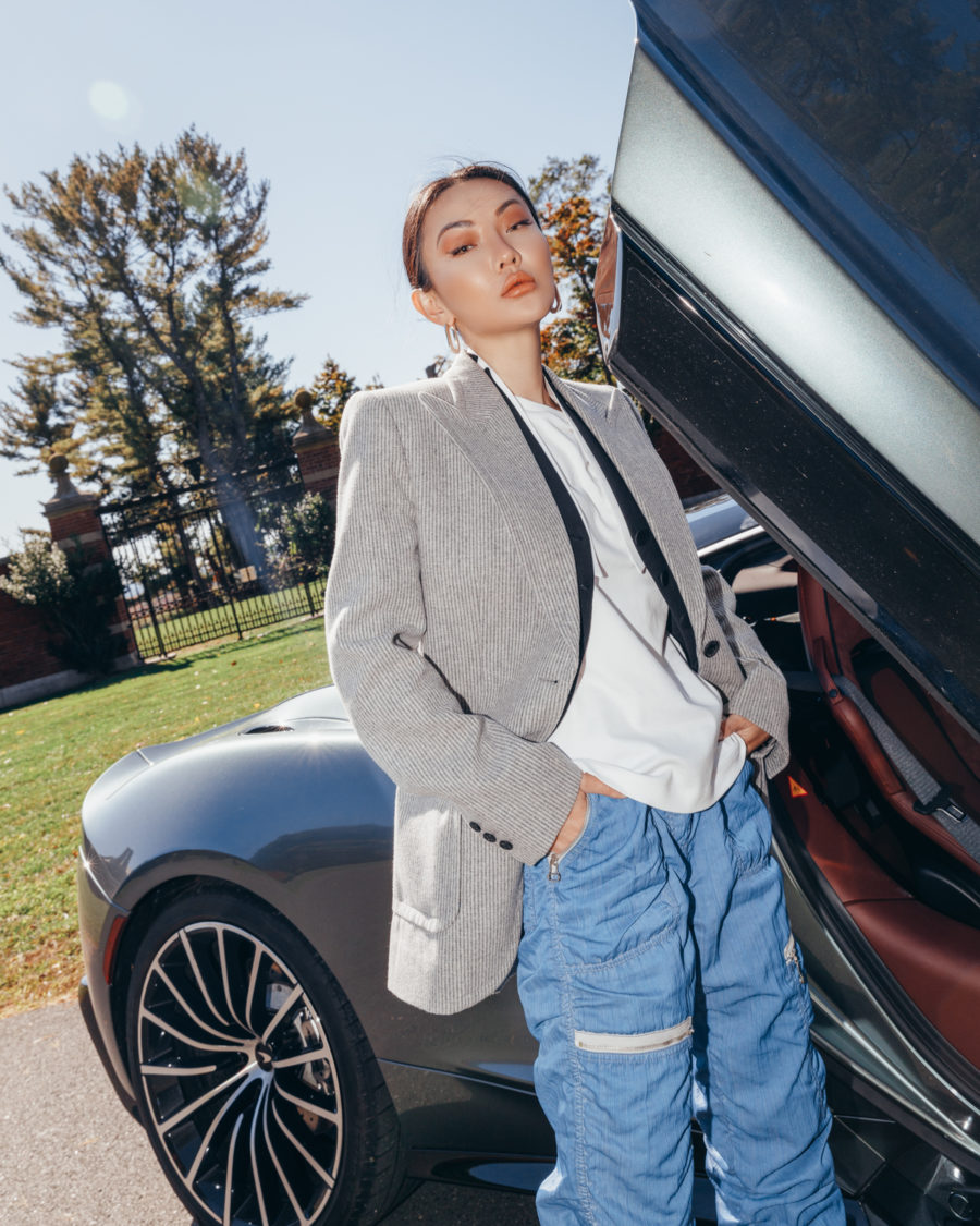 Jessica Wang wearing a blazer with a white t shirt and blue pants while sharing her tips on becoming an influencer in 2021 // Jessica Wang - Notjessfashion.com