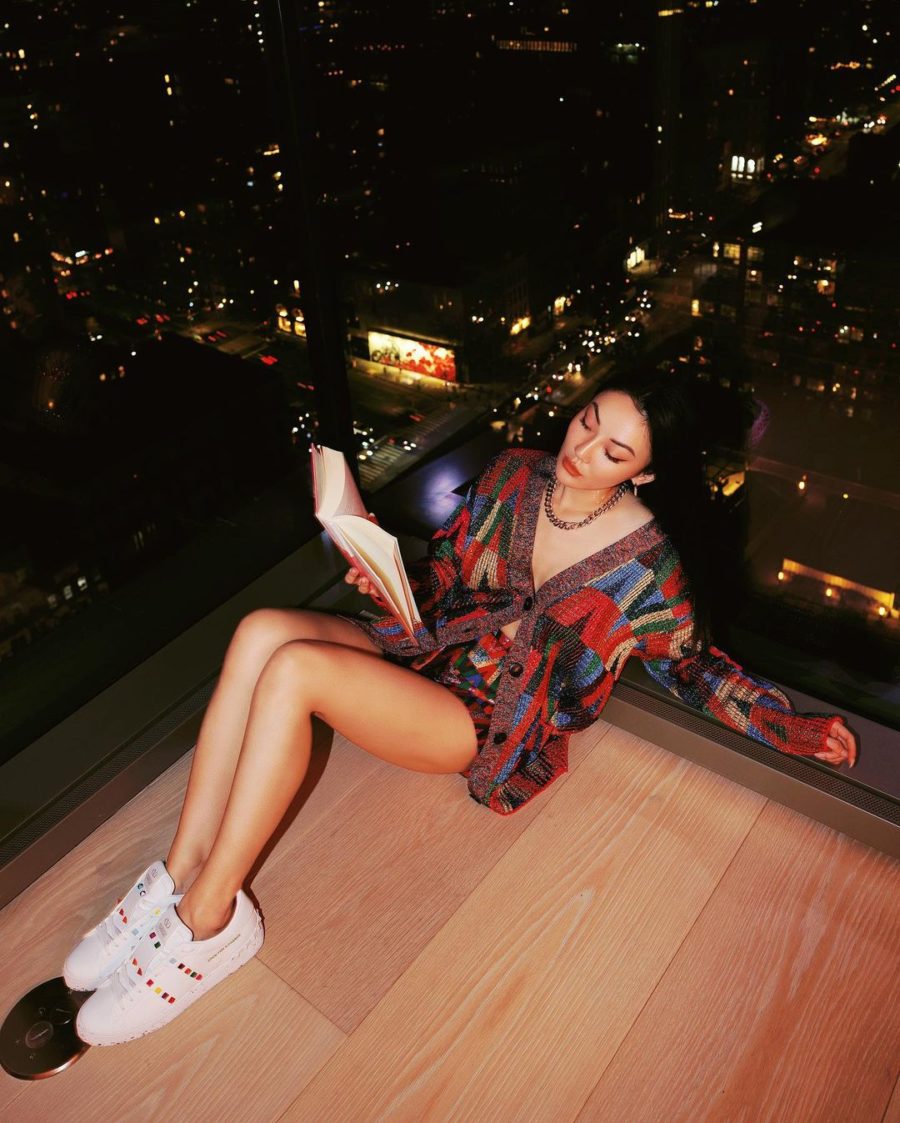 Jessica Wang wearing an oversized monogram cardigan and metallic shorts while sharing fashion trends 2022 // Jessica Wang - Notjessfashion.com