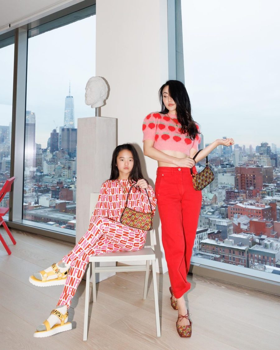 Jessica Wang wearing a cropped sweater top with red pants and charles keith tiger mules while sharing her favorite Lunar New Year capsule // Jessica Wang - Notjessfashion.com