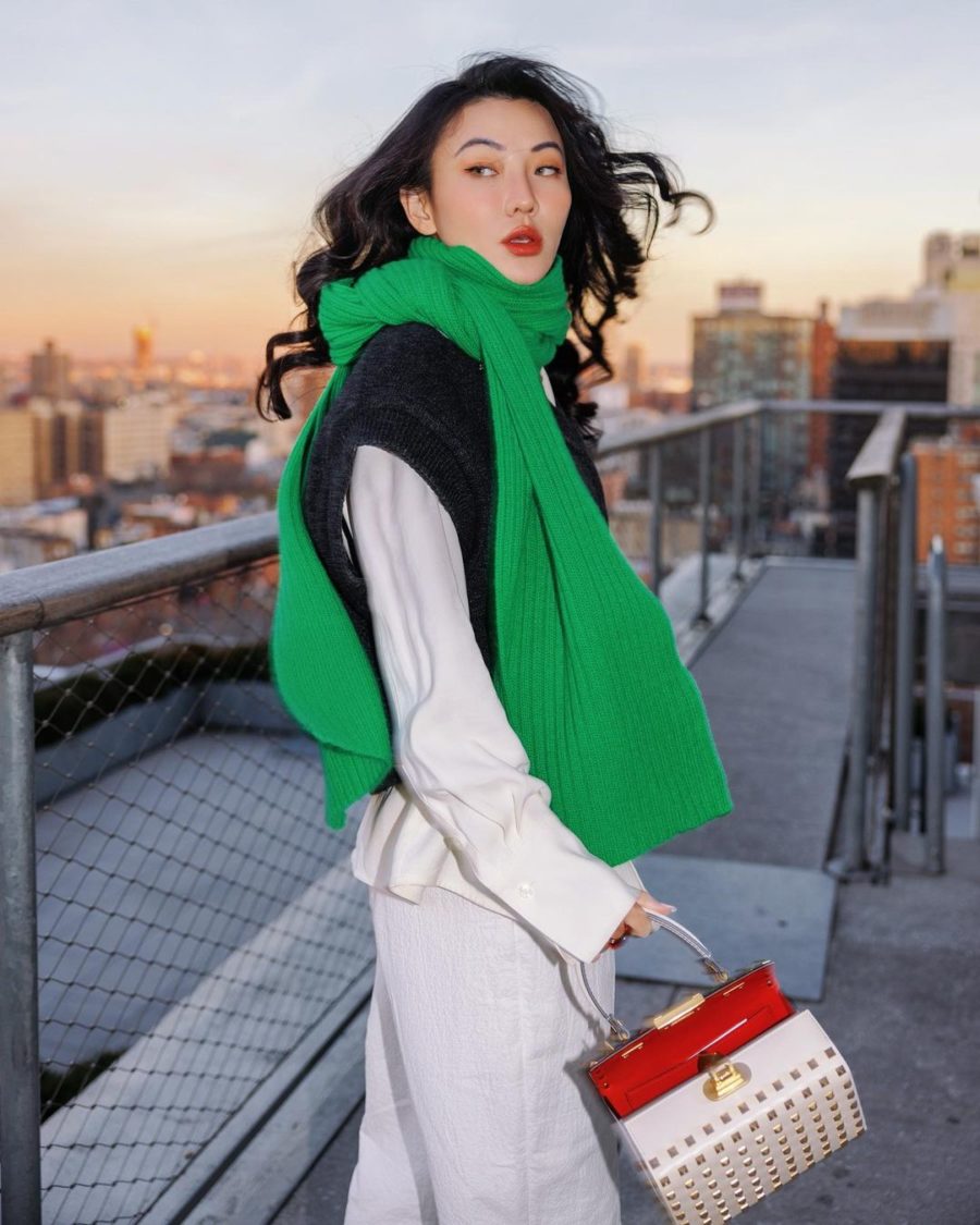 Jessica Wang wearing an oversized sweater vest with a button down shirt and trousers while sharing cute winter outfits // Jessica Wang - Notjessfashion.com