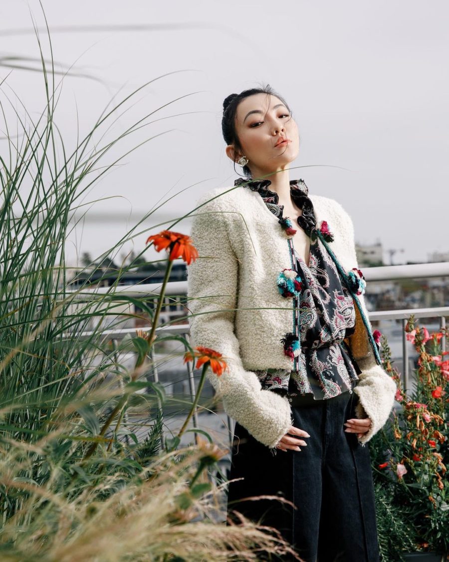 Jessica Wang wearing a sherpa cardigan with a printed ruffle blouse while sharing her favorite spring makeup trends 2022 // Jessica Wang - Notjessfashion.com
