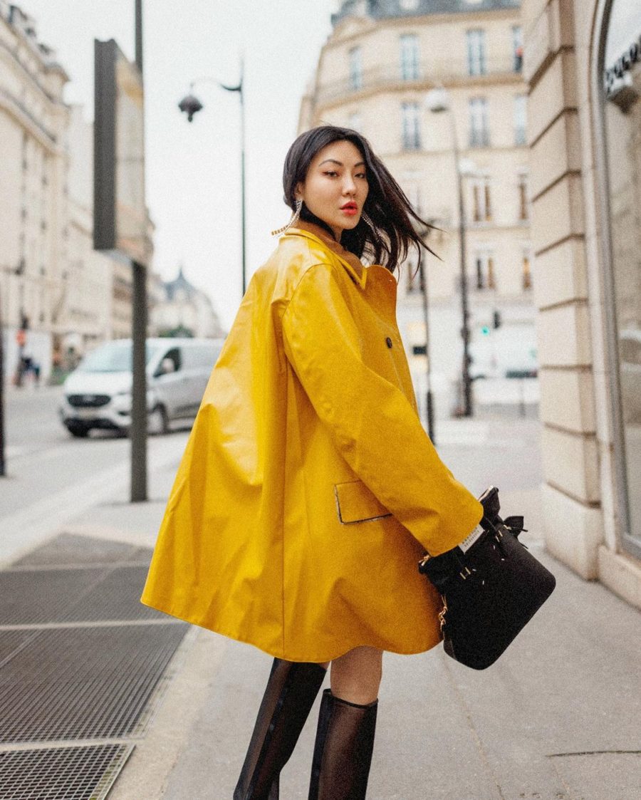 Jessica Wang wearing lightweight jackets for spring featuring a rain jacket with boots // Jessica Wang - Notjessfashion.com
