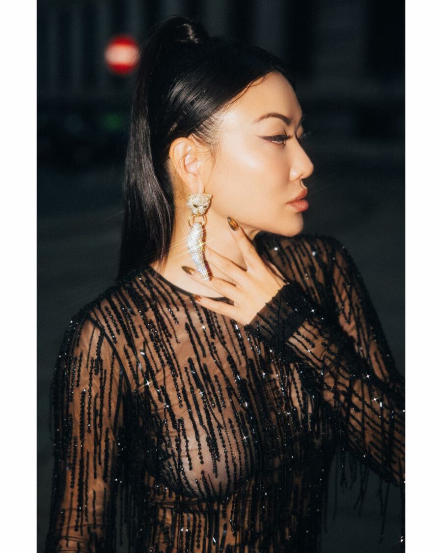 Jessica Wang wearing an embellished sheer maxi dress with tiger tooth earrings // Jessica Wang - Notjessfashion.com
